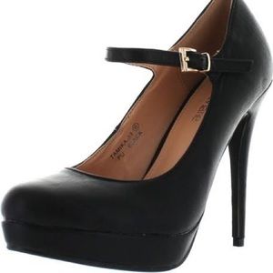 Black closed toe heels with ankle strap